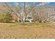 Charming home with a large front yard and inviting porch with white stairs, perfect for a relaxed lifestyle at 127 Hyde Way, Dallas, GA 30157