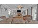 Cozy living room featuring a fireplace and abundant natural light at 127 Hyde Way, Dallas, GA 30157
