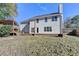 A well-maintained two-story home with a spacious backyard featuring a deck and a covered hot tub at 2697 Links Overlook Drive Dr, Dacula, GA 30019
