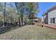 A well-maintained two-story home with a spacious backyard featuring a deck and a covered hot tub at 2697 Links Overlook Drive Dr, Dacula, GA 30019