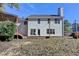 A well-maintained two-story home with a spacious backyard featuring a deck and a covered hot tub at 2697 Links Overlook Drive Dr, Dacula, GA 30019