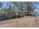 A spacious wood deck with a pergola-covered hot tub offers a relaxing outdoor space at 2697 Links Overlook Drive Dr, Dacula, GA 30019