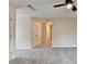 Spacious neutral bedroom featuring plush carpeting, natural light, and ample room for furniture at 2697 Links Overlook Drive Dr, Dacula, GA 30019