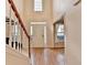 Front entryway offers hardwood floors and a staircase visible from the front door at 2697 Links Overlook Drive Dr, Dacula, GA 30019