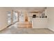 Charming eat-in kitchen with hardwood floors and white cabinetry at 2697 Links Overlook Drive Dr, Dacula, GA 30019