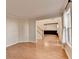 Living room features hardwood floors leading to staircase and front door at 2697 Links Overlook Drive Dr, Dacula, GA 30019