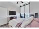 Bedroom with a large window, hardwood floor, and a view to the outside balcony at 3040 Peachtree Nw Rd, Atlanta, GA 30305