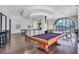 Elegant game room with a pool table, lounge area, and stylish decor, ideal for entertaining at 3040 Peachtree Nw Rd, Atlanta, GA 30305