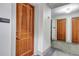 Hallway with hardwood doors and unit number displayed for easy identification at 3040 Peachtree Nw Rd, Atlanta, GA 30305