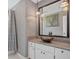 Bathroom with white vanity, a vessel sink, and a granite countertop, creating a spa-like experience at 3681 Donavan Ct, Decatur, GA 30034