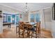 Bright dining area features hardwood floors, chandelier, and a wooden table with seating for six at 3681 Donavan Ct, Decatur, GA 30034