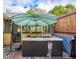 Outdoor hot tub area with cover and retractable shade at 3681 Donavan Ct, Decatur, GA 30034