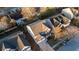 An aerial view of the home showcasing the roof, driveway, and surrounding neighborhood at 2496 Gristhaven Ln, Buford, GA 30519