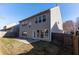 This property has a fenced backyard with a small patio area at 2496 Gristhaven Ln, Buford, GA 30519