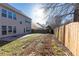 This property features an expansive backyard with a charming patio area at 2496 Gristhaven Ln, Buford, GA 30519