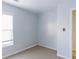 A bedroom featuring neutral carpet and a window provides natural light, creating a serene and comfortable atmosphere at 2496 Gristhaven Ln, Buford, GA 30519