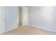 An adaptable bedroom features neutral carpet with access to a closet, providing functionality and convenience at 2496 Gristhaven Ln, Buford, GA 30519