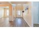 Welcoming entryway featuring wood-look floors and natural light at 2496 Gristhaven Ln, Buford, GA 30519