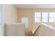 Bright stairwell with natural light from windows at 2496 Gristhaven Ln, Buford, GA 30519