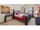 Bedroom featuring a four-poster bed, sitting area, and carpeted flooring at 4058 Rosebay Way, Conyers, GA 30094