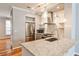 Beautiful modern kitchen featuring stainless steel appliances, granite countertops, and lots of light at 1126 Village Se Ct, Atlanta, GA 30316