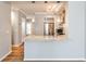 Kitchen with a breakfast bar, stainless steel appliances, hardwood floors and neutral paint at 1126 Village Se Ct, Atlanta, GA 30316