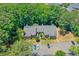 Aerial view of apartments with parking and surrounded by lush trees at 2937 Torreya Way, Marietta, GA 30067