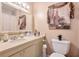 Bathroom with a large mirror, lighting fixtures, and a vanity with sink and decor at 2937 Torreya Way, Marietta, GA 30067