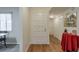 Bright entryway with wood floors, closet, and view into the dining area, ideal for welcoming guests at 2937 Torreya Way, Marietta, GA 30067