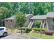 Inviting condo exterior with well-manicured landscaping and ample parking space at 2937 Torreya Way, Marietta, GA 30067