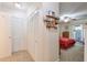 Hallway with closet space leading to the bedroom with ceiling fan and outdoor access at 2937 Torreya Way, Marietta, GA 30067