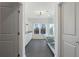 Bathroom with double vanity, shower, soaking tub and grey tile floor at 364 Poplar Springs Rd, Hiram, GA 30141