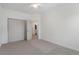 Bedroom view showcasing bi-fold closet and ensuite bathroom access at 364 Poplar Springs Rd, Hiram, GA 30141