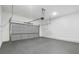 Spacious two car garage with concrete floor and white walls at 364 Poplar Springs Rd, Hiram, GA 30141