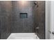 Shower featuring a bathtub and tile walls at 364 Poplar Springs Rd, Hiram, GA 30141