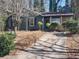 A charming one-story home with a well-maintained front yard and a paved driveway at 4952 Isle Royal Ct, Stone Mountain, GA 30088