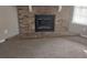 Cozy living area featuring a brick fireplace perfect for creating a warm and inviting atmosphere at 4952 Isle Royal Ct, Stone Mountain, GA 30088