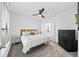 Bright bedroom with a ceiling fan, a big window with blinds, carpet flooring and a view to a bathroom at 821 Ralph Mcgill Ne Blvd # 3201, Atlanta, GA 30306