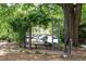 This shady common area has seating and park-like views at 821 Ralph Mcgill Ne Blvd # 3201, Atlanta, GA 30306