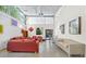 This well-lit common room has couches, chairs, and tables at 821 Ralph Mcgill Ne Blvd # 3201, Atlanta, GA 30306