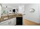 Open-concept kitchen with granite countertops, stainless appliances, and breakfast bar at 821 Ralph Mcgill Ne Blvd # 3201, Atlanta, GA 30306
