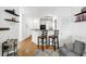 Living space with breakfast bar, comfortable seating, and hardwood floors at 821 Ralph Mcgill Ne Blvd # 3201, Atlanta, GA 30306
