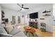 Open living room with hardwood floors, comfortable seating, and natural light at 821 Ralph Mcgill Ne Blvd # 3201, Atlanta, GA 30306