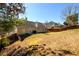 Expansive backyard featuring a spacious lawn and wooden fencing, perfect for outdoor activities and privacy at 892 Creek Bottom Rd, Loganville, GA 30052
