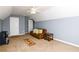 This bonus room boasts neutral carpeting, vaulted ceilings, and space for entertaining and relaxing at 892 Creek Bottom Rd, Loganville, GA 30052