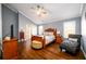 Spacious main bedroom with vaulted ceiling, hardwood floors, and ample closet space at 892 Creek Bottom Rd, Loganville, GA 30052
