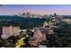 Panoramic nighttime view featuring the illuminated city skyline from a high-rise apartment at 2660 Peachtree Nw Rd # 14D, Atlanta, GA 30305