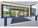 Building entrance with glass doors and 'Park Place' mat at 2660 Peachtree Nw Rd # 14D, Atlanta, GA 30305