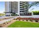 Front entrance of the Park Place on Peachtree building with manicured lawn at 2660 Peachtree Nw Rd # 14D, Atlanta, GA 30305
