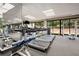 A fitness center with treadmills, weight machines, and large windows at 2660 Peachtree Nw Rd # 14D, Atlanta, GA 30305